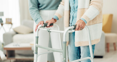 Woman, hands and walker in elderly care for physiotherapy, support or trust at old age home....