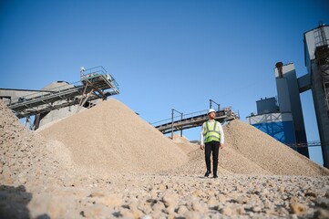 Engineer at the Crushed stone production plant. Gravel