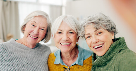 Selfie, fun and senior woman friends happy in a home for a visit during retirement together....
