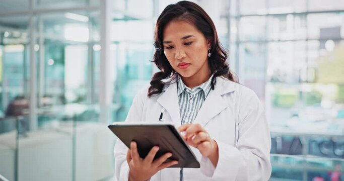 Woman, doctor and medical with tablet in hospital for research, diagnosis and treatment for patient information. Female person, healthcare and digital with online test results for Telehealth report
