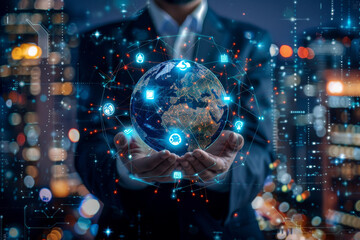 Obraz premium A man in a suit is holding a globe in his hands