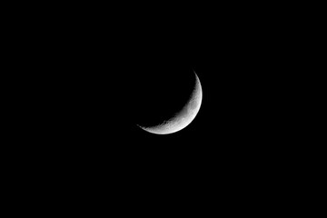 Crescent Moon is in black sky, close up