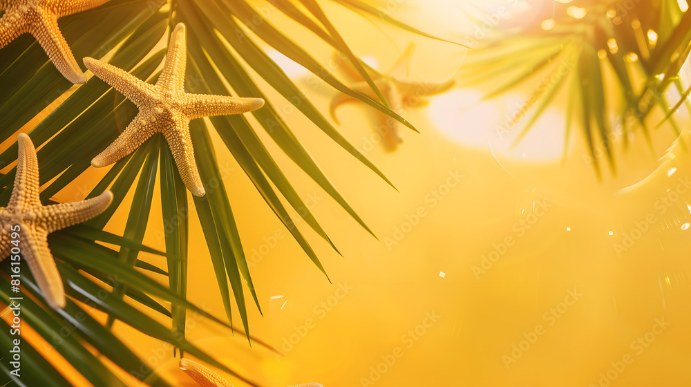 Poster tropical background palm trees branches with blurred starfish on yellow background holiday travel co
