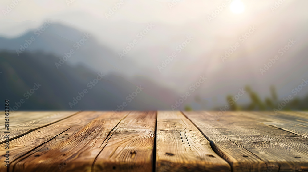 Poster empty wooden table with blurred mountain view background free space can be used for montage or produ