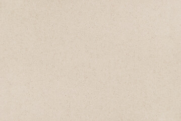 Craft paper texture, a sheet of beige recycled cardboard texture as background