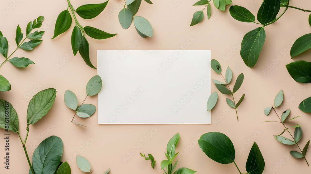 Poster white flat paper rectangle shape at center and fresh green leaves foliage isolated with empty space 