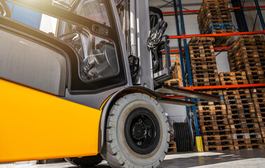 Forklift Truck Moving Pallets in Warehouse