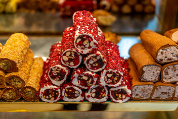 Eastern sweets. Assorted traditional Turkish delight (Rahat lokum). Turkish delight with different nuts and coconut shavings.