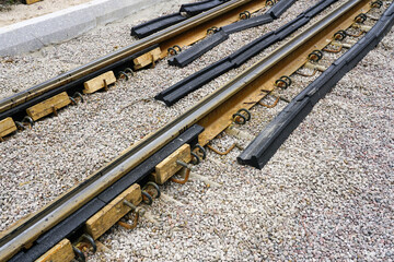 Attaching polyurethane pads to new tram rails to reduce vibration and noise emissions