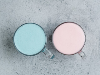 Trendy drink: Blue and pink latte. Hot butterfly pea latte or blue spirulina latte and pink...
