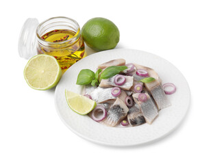 Plate with tasty fish, marinade and lime isolated on white