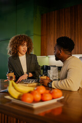 Interracial innovative colleagues discussing renewable resources.