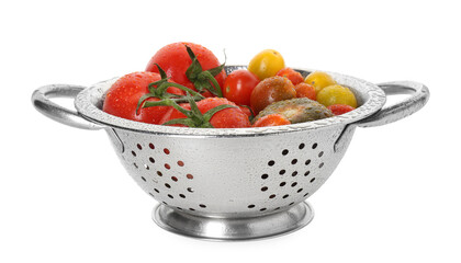 Metal colander with fresh tomatoes isolated on white