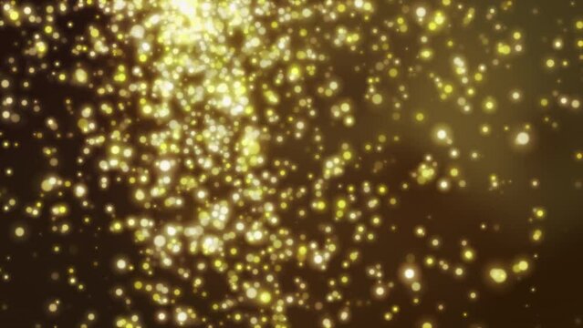 Golden glittering particles falling in a seamless loop. Animation of luxurious gold particles. A perfect background for award ceremonies, weddings and celebrations.