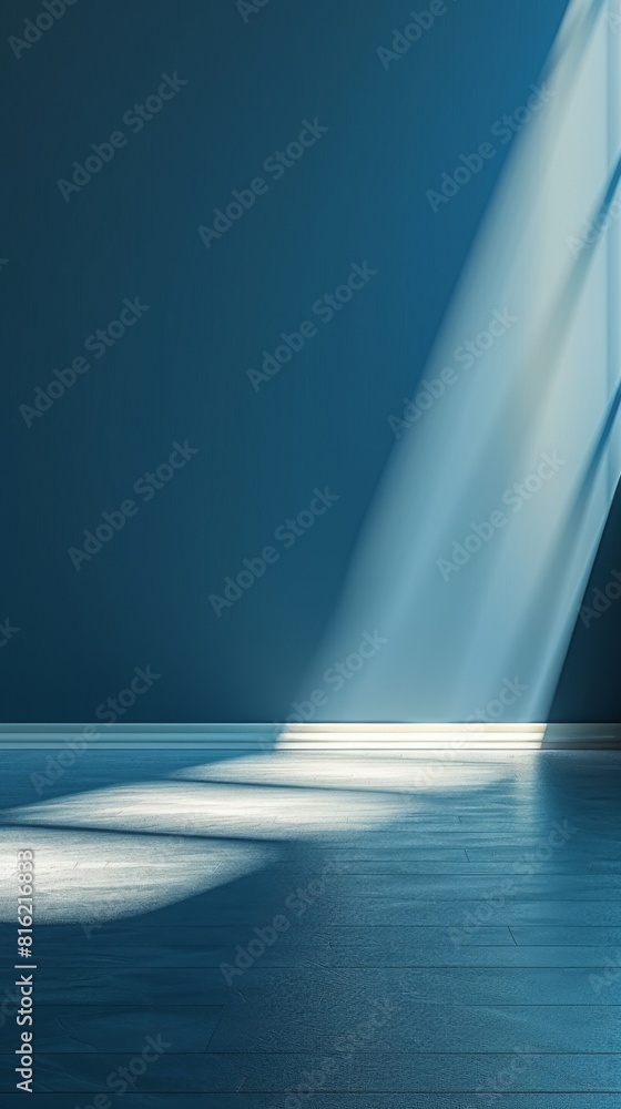 Aufkleber an empty room with sunlight streaming in through a window, creating a beam of light on the floor
