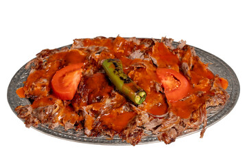 iskender kebab. Traditional Turkish cuisine flavor with tomato sauce and butter. iskender kebab isolated on white background