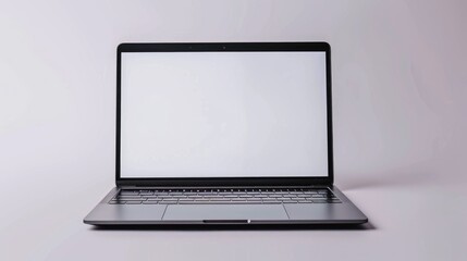 Fototapeta premium Gray laptop with black keyboard and empty screen for adding text