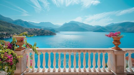 A sunny day view from a balcony overlooking the sea and mountains.

 - Powered by Adobe