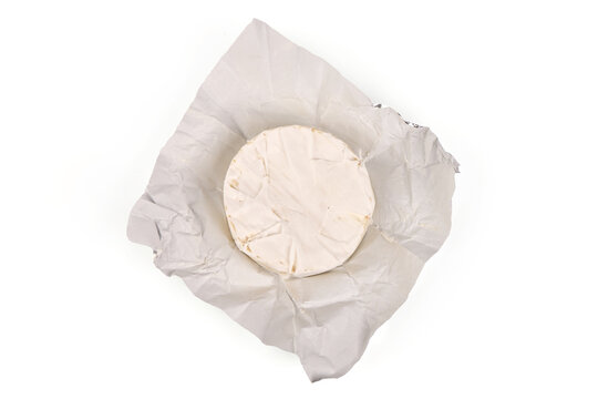 Fresh Camembert cheese. Sliced Brie cheese, isolated on white background
