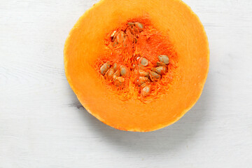 Closeup of raw pumpkin slice isolated