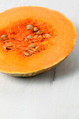 Closeup of raw pumpkin slice isolated