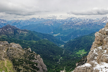 Naklejka premium Beautiful Nature Mountain Scenery. Dolomite mountains Italy. Aerial view of the village of san martino di castrozza dolomites trentino. Rough and steep rock. At Gardena Valley in South Tyrol, Italy