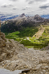 Beautiful Nature Mountain Scenery. Dolomite mountains Italy. Aerial view of the village of san...