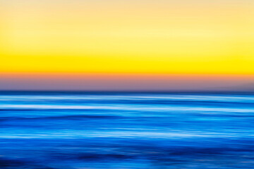 Sunset over the ocean, water with long exposure
