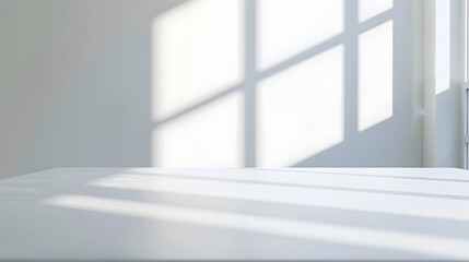 Fototapeta premium Empty white desk with morning light and shadows of windows with copy space summer concert Blurred backdrop abstract background for display product : Generative AI