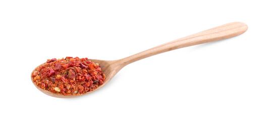 Aromatic spice. Red chili pepper flakes in spoon isolated on white
