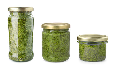 Pesto sauce in jars isolated on white, set