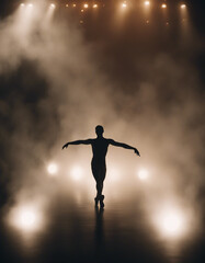 silhouette of a male pro ballet dancer in front of spotlights and smoke
