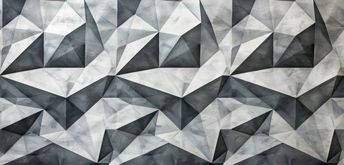 A geometric pattern of diamonds and triangles in shades of gray, creating a sense of movement and rhythm.
