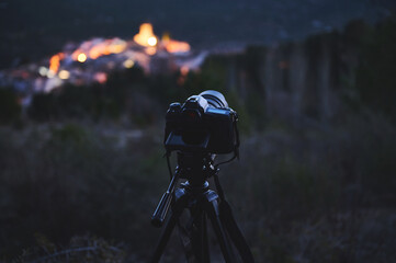 Digital camera placed on tripod, capturing the Andalusian medieval city of Quesada in mountains...