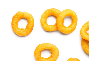 Fried breaded onion rings on white background