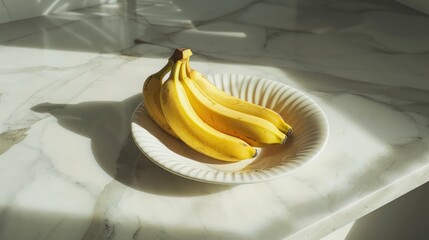 plate of ripe bananas placed on a marble countertop, with morning sunlight creating soft shadows and a warm atmosphere.