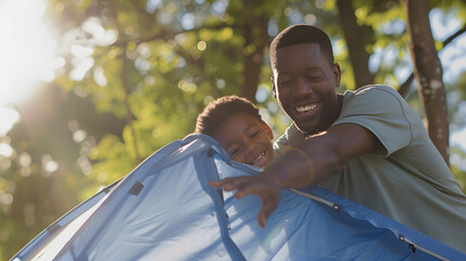 Happy african american son and father pitching tent together in sunny garden summer childhood fatherhood free time camping togetherness and outdoor activities unaltered : Generative AI