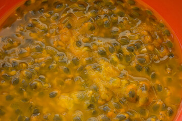 Macro photography of passion fruit pulp.