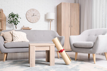 Interior of living room with sofa, armchair and gift fitness mat