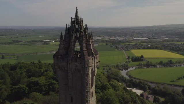Aerial close view of National Wallace Monument Victorian Gothic architectural landmark and tourist attraction in Scotland, UK