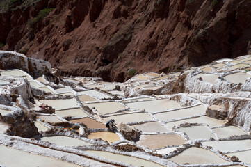 Evaporation tanks in the mountains where salt is extracted in Maras in Peru