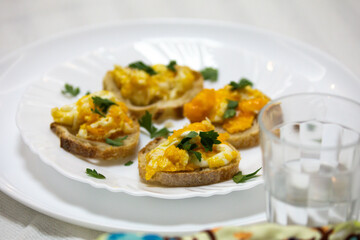 Healthy breakfast, toast with avocado, eggs and tomatoes