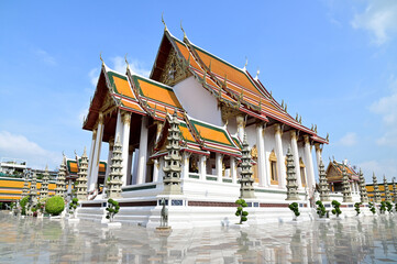 BANGKOK, THAILAND - May 15, 2024: View of Wat Suthat Thepwararam Ratchaworamahawihan with blue sky...