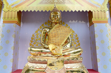 BANGKOK, THAILAND - MAY 15, 2024: Golden Buddha statues in Buddhist temples for those who have...