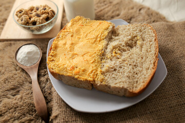 Bread with salted egg spread on a plate for healthy breakfast	
