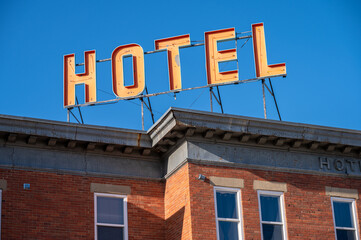 Hotel sign on old brick hotel on the main street of the small town of Bassano, Alberta.