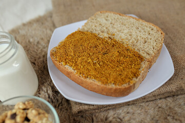 Bread with chicken floss on a plate for breakfast. Homemade bread with dried shredded chicken