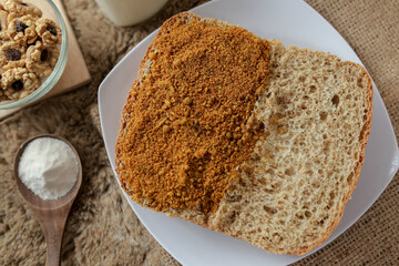 Bread with chicken floss on a plate for breakfast. Homemade bread with dried shredded chicken