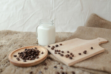 Delicious iced coffee, mocca, and chocolate drinks with coffee beans on white wooden table	
