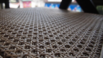 Fototapeta premium A closeup view of a pattern on a chair in a cafe